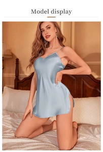 Detailed view of light blue satin nightgown with thin straps and V-neckline design