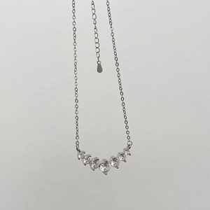 Macro shot of silver S925 sterling silver stamp and polished chain link details