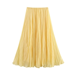 Jupe longue plissée élégante pour femme en jaune avec coupe en A et tissu mousseline fluide