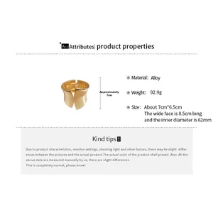 Detailed view of irregular wide metal cuff with dimensions and weight measurements