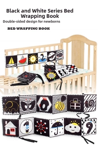 Double-sided high contrast black and white baby cloth book with ties for crib attachment