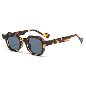Retro polygon sunglasses with tortoiseshell frames and blue lenses shown from a 45-degree angle