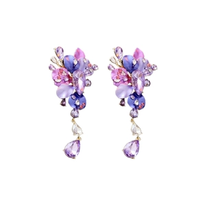 Elegant gold earrings with purple floral resin petals and sparkling teardrop crystals