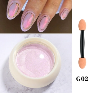 Detail of G02 pink aurora nail powder showing a jar, applicator brush, and iridescent finish