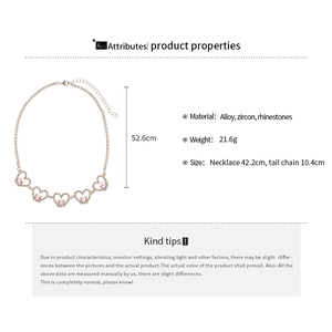 Detail of rose gold necklace with pink heart zircons and adjustable 10.4cm tail chain