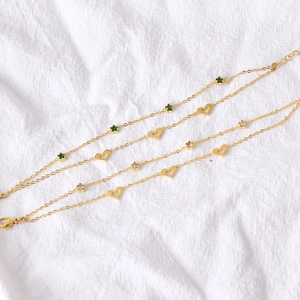 Minimalist gold titanium steel bracelet with hollow heart and star zircon pendants