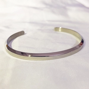 Polished silver stainless steel open C-shape cuff bracelet with a minimalist flat design