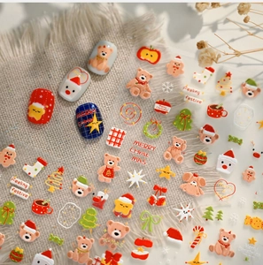 3D relief Christmas nail art stickers featuring cartoon bears, Santa, and trees