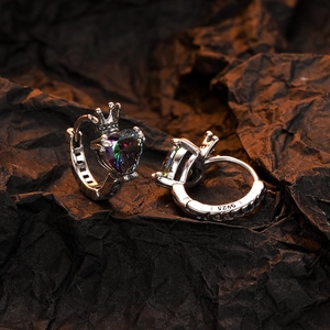 S925 silver crown heart earrings with rainbow cubic zirconia on dark background