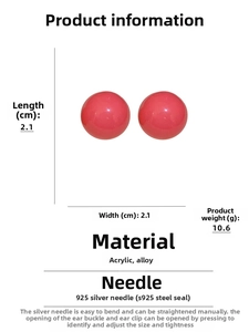 Detail view of red acrylic ball earrings with S925 silver needles and 2.1cm dimensions
