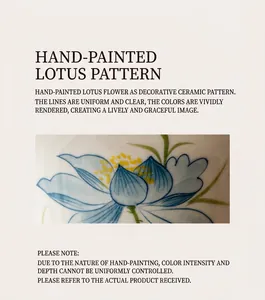 Macro detail of hand-painted lotus pattern on a blue ceramic airtight tea canister