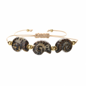 Bohemian handmade adjustable bracelet featuring natural ammonite fossils and gold beads