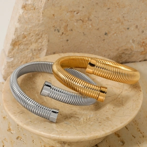 Minimalist spiral spring open cuff bracelets in polished gold and silver finish