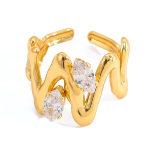 Detailed close-up of wavy 18K gold-plated ring with two marquise-cut zircon stones