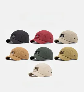 Collection of short brim plaid baseball caps in seven colors with leather patch detail