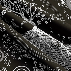 Macro detail of the tree of life tapestry with star patterns and astrological symbols