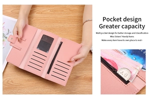 Close-up of pink tri-fold leather wallet showing card slots and zipper coin pocket