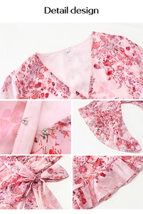 Detail view of pink floral chiffon dress featuring V-neckline, ruffle sleeves and waist tie