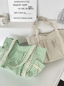 Polka dot canvas tote bag with lace trim in mint green and beige colors