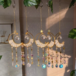 Golden moon sun catcher with natural crystal stones and hanging prisms for window decor