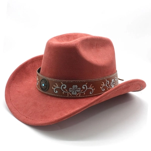 Detail of western cowboy hat with floral embroidered leather band and turquoise stud