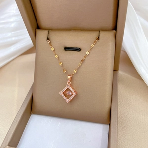 Elegant rose gold titanium square necklace with sparkling crystals in a beige gift box