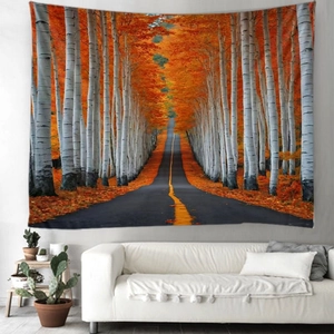Detail of birch forest tapestry with autumn road scene hanging over a white sofa