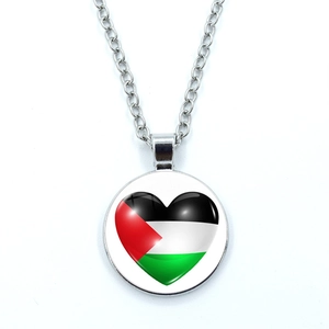 Palestine flag heart glass dome pendant necklace with silver chain on white background