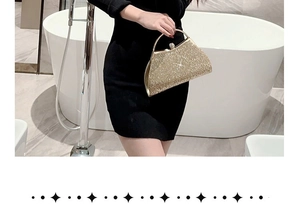 Chic gold sequin evening clutch bag with metallic curved handle shown in a luxury setting