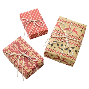 Three-piece Christmas gift box set with reindeer and snowflake patterns on white background