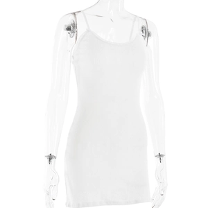 Detail of white cotton dress showing fine ribbed texture and v-neck lace trim design
