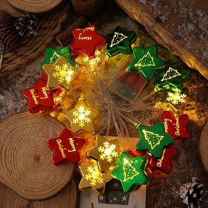 Star LED string lights in gold red and green for Christmas tree decor with warm glow