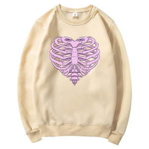 Beige crewneck sweatshirt with pink heart ribcage graphic print in a flat lay view