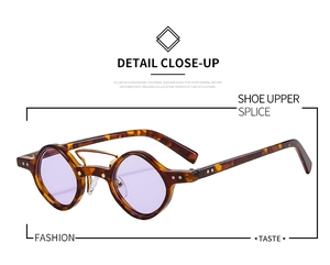 Detail close-up of retro round tortoiseshell sunglasses with light purple tinted lenses