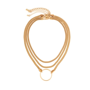 Detail of golden triple layered snake bone choker with circular geometric pendant