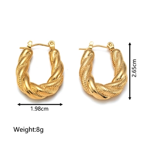 Detailed view of golden twisted U-shape hoop earrings with dimensions 1.98cm by 2.65cm