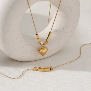 Minimalist gold heart and cube bead necklace set with matching bracelet for women