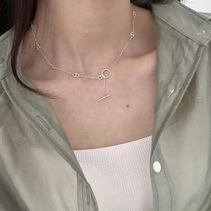 Silver 925 anchor chain necklace with toggle clasp shown on a female model neck