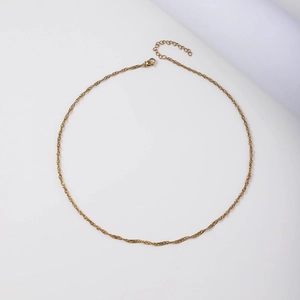 Detail of 18K gold-plated stainless steel water wave chain with lobster clasp and extender