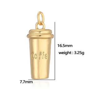 Detailed view of a gold coffee cup charm with dimensions 16.5mm height and 3.25g weight