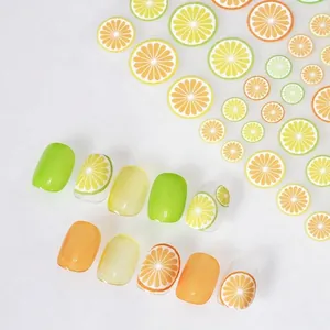 Summer fruit nail stickers featuring lemon and orange slices for vibrant nail art designs