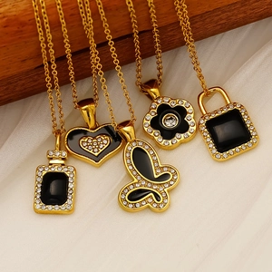 18K gold plated necklace set with butterfly and heart charms featuring black enamel and rhinestones