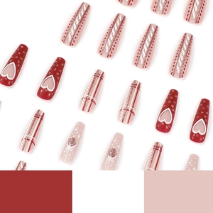 Long ballerina press-on nails with red heart patterns, glitter, and matte finish