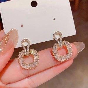 Elegant gold square stud earrings with 925 silver needles and sparkling cubic zirconia