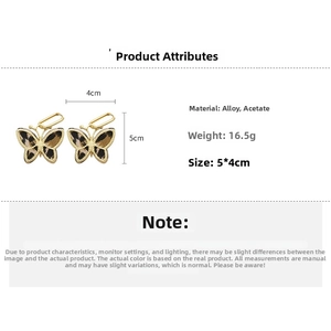 Detail view of leopard print acetate butterfly earrings with 5x4cm size and 16.5g weight
