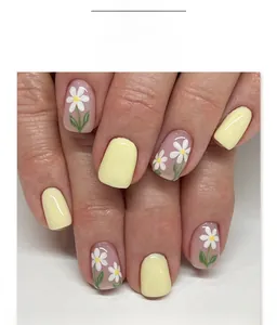 Macro shot of square nails with yellow and pink daisy floral designs, item JP3921