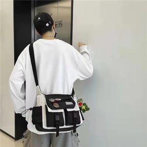 Japanese style black and white crossbody messenger bag with cute dinosaur pendant