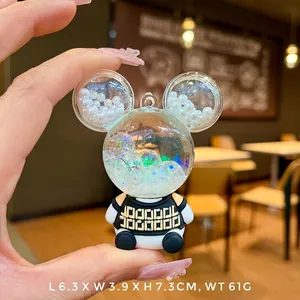 Detailed view of Mickey-shaped acrylic keychain showing size 7.3cm height and weight 61g