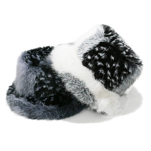 Close-up of thick faux fur bucket hats in gradient grey and black spotted patterns