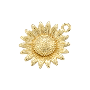 Macro shot of 14K gold plated sunflower pendant showing detailed texture and metallic luster